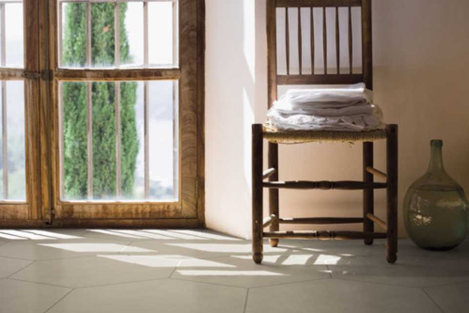 slate hexagon tile in entryway with rustic wood accents